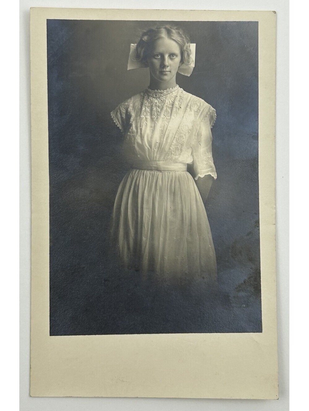 Antique RPPC Postcard Young Woman White Lace Dress Large Hair Bow c1910     E-12